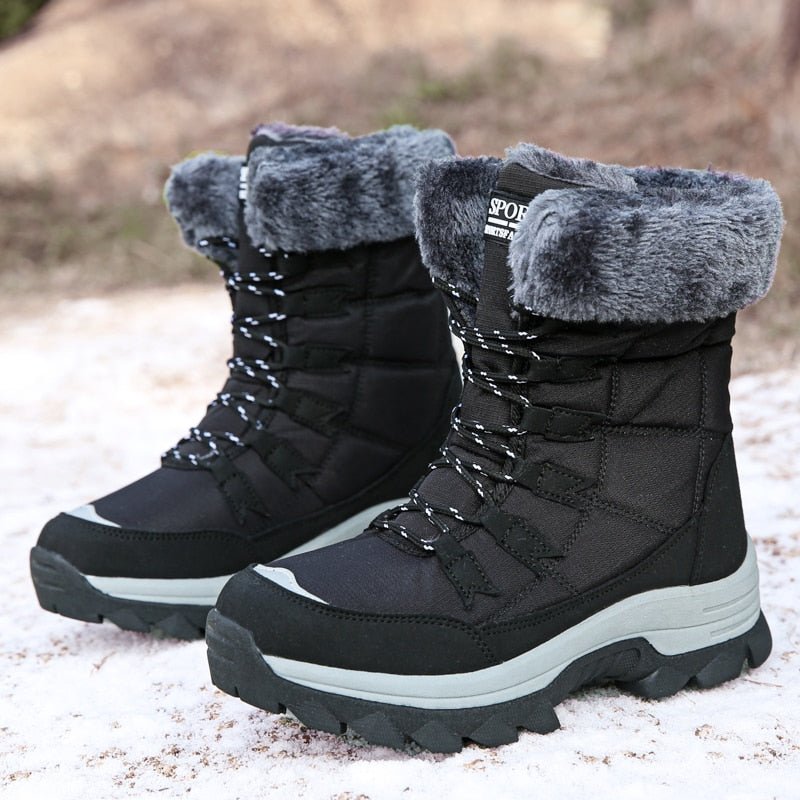 Grey fleece-lined lace-up snow boots, pair view