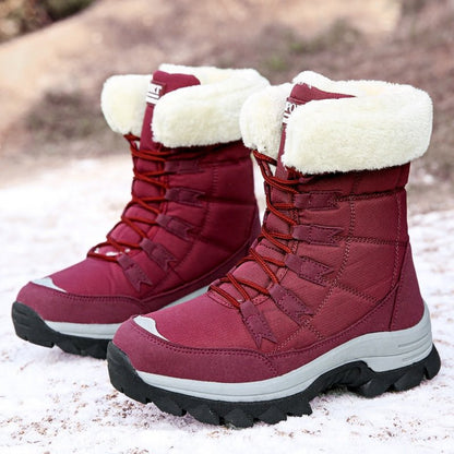 Wine red lace-up snow boots with faux fur cuff, pair view