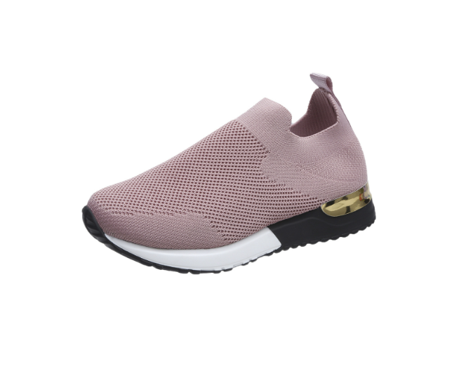 Pink slip-on knit sneakers with white grip sole, side view