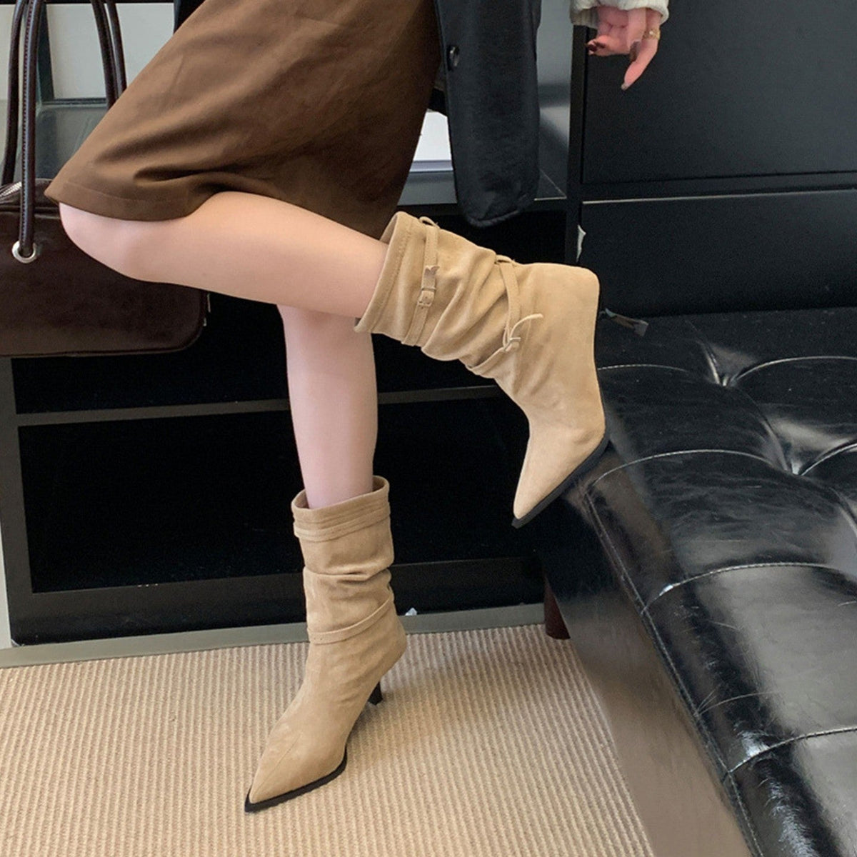 Khaki slouch ankle boots with kitten heel, side view