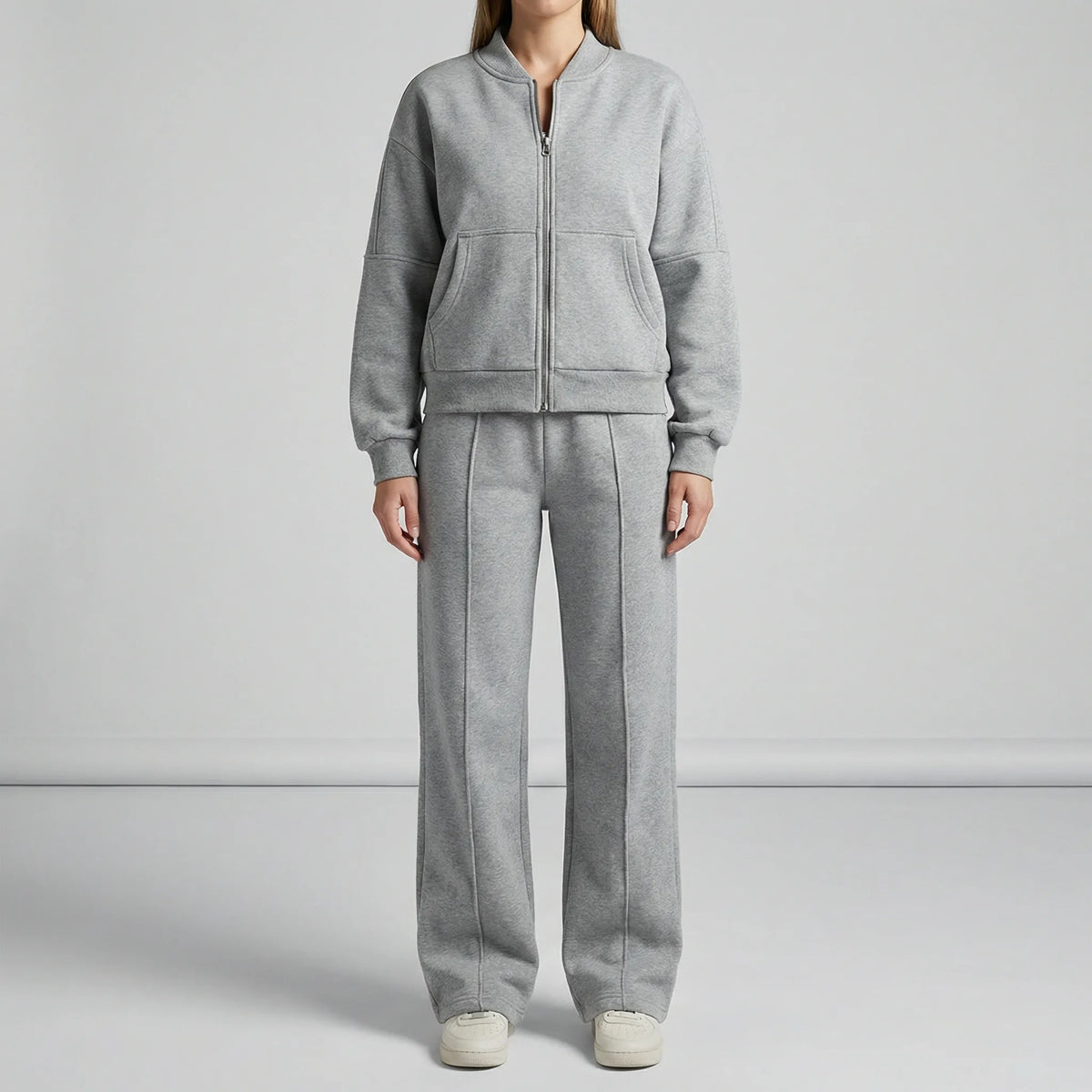 Women's zip-up jacket tracksuit set in grey, full length view
