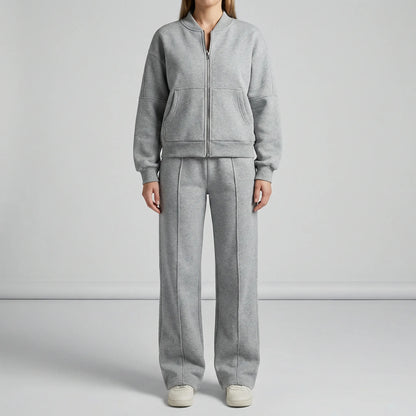 Women's zip-up jacket tracksuit set in grey, full length view