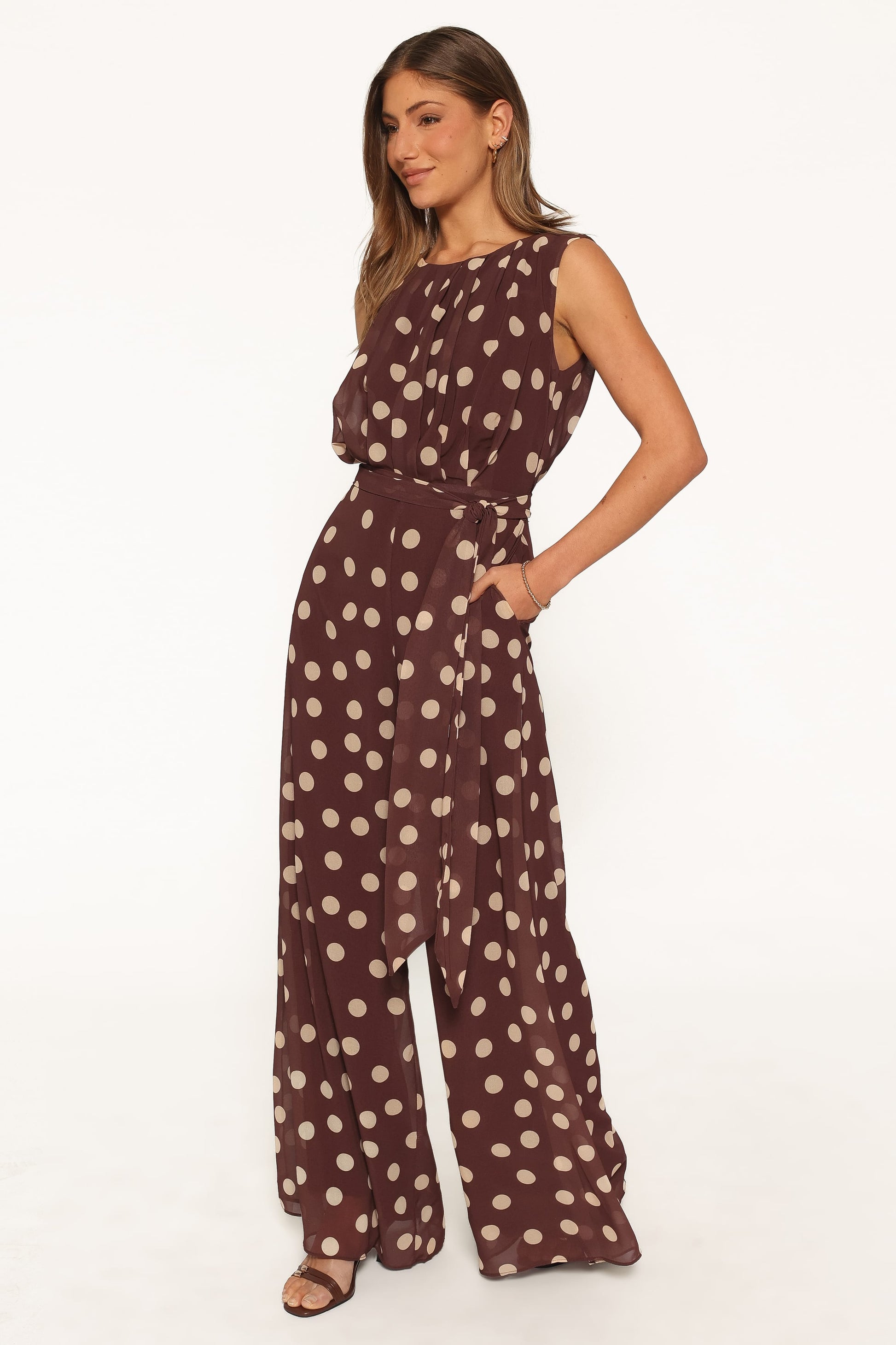Chic Sleeveless Jumpsuit With Tie Waist And Brown Polka Dot Print 2