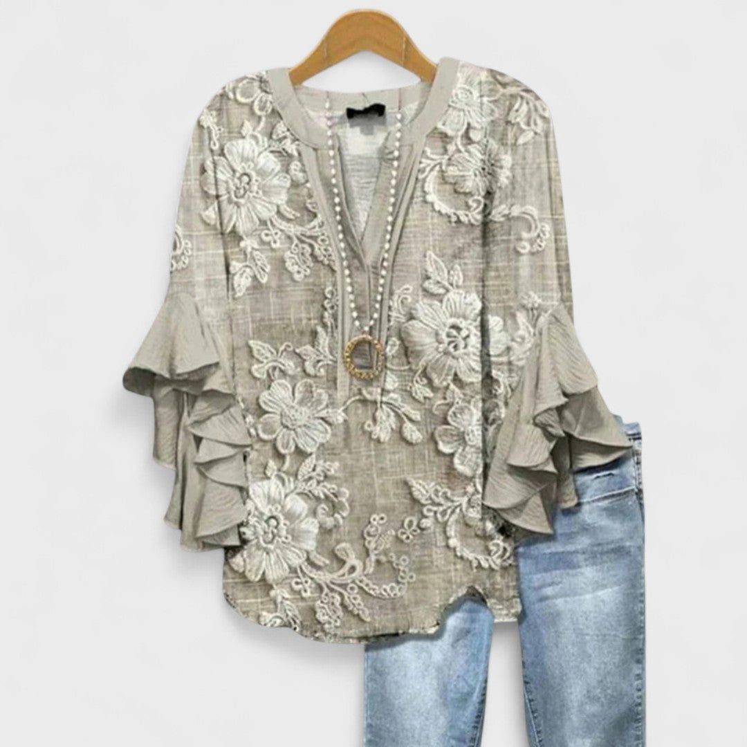 Elegant V-Neck Blouse with Layered Ruffle Sleeves and Patterned Design 7